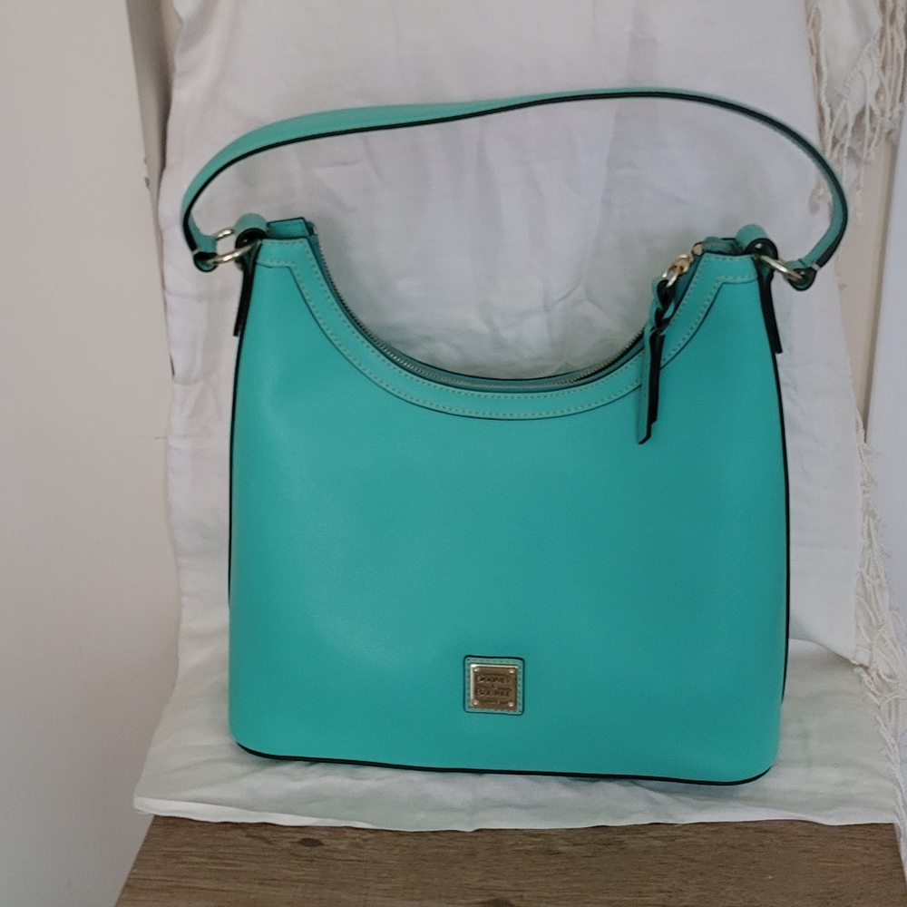 Turquoise Dooney and Bourke should bag
